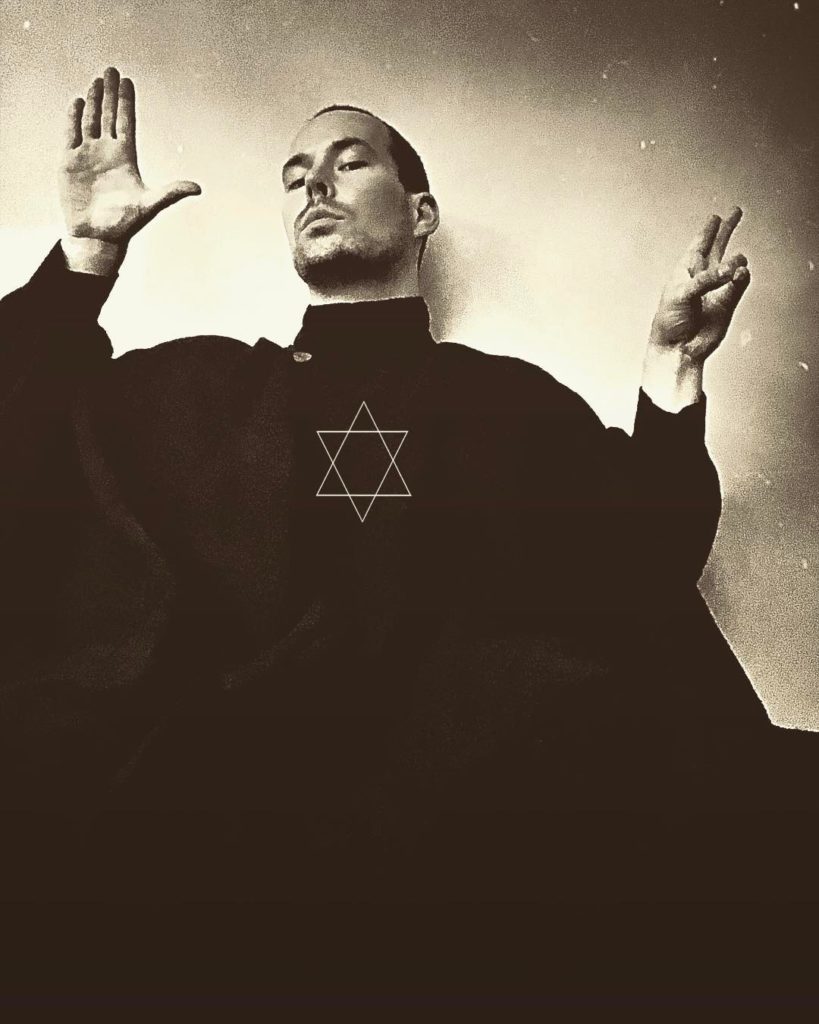 Frater Ifpas - on Instagram "this_occult_life" in black altar robe with hexagram 